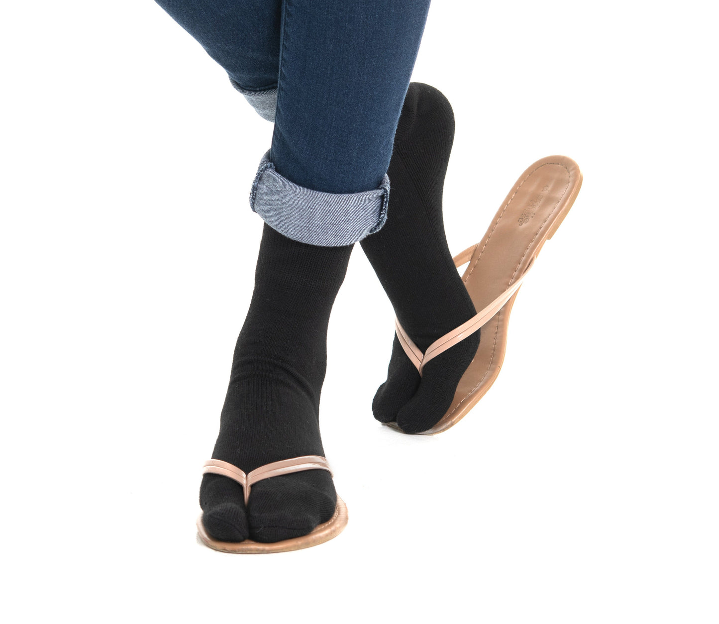 Close-up of black V-Toe split-toe tabi mini-crew socks worn on the feet