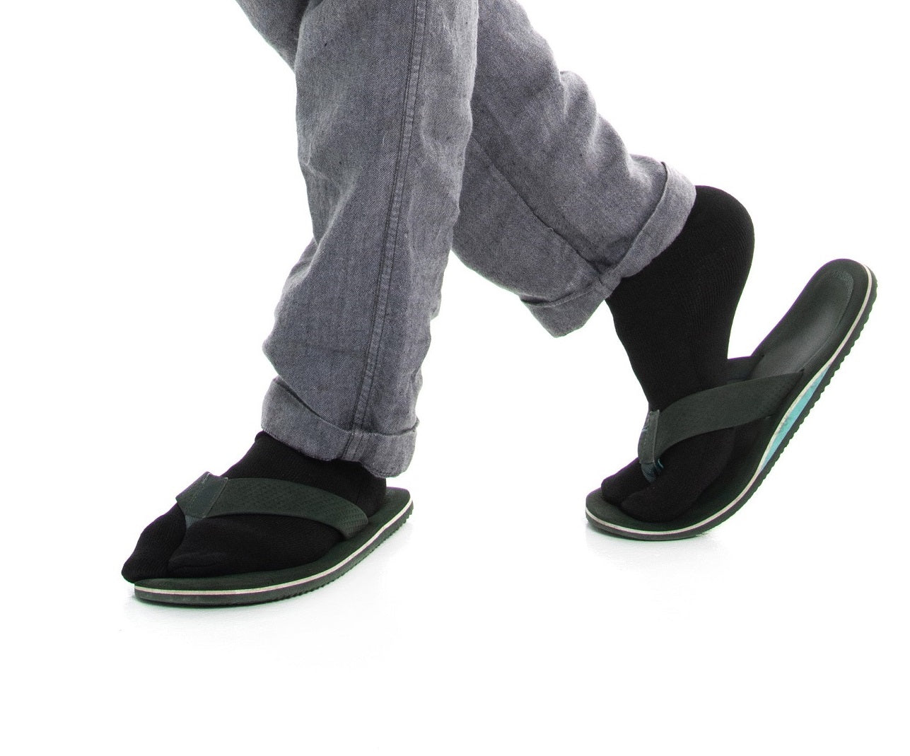 Close-up of black V-Toe athletic split-toe tabi mini-crew socks worn on the feet