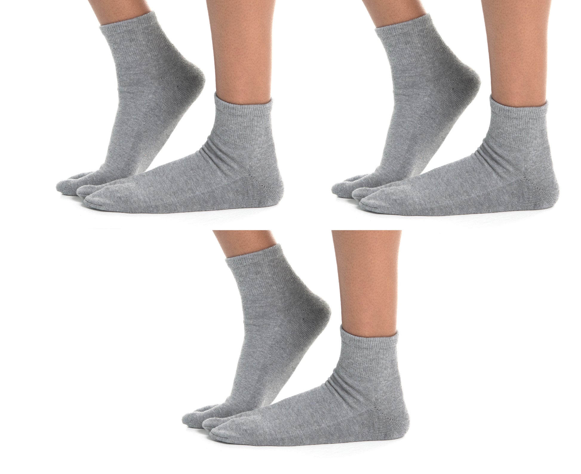 Close-up of grey V-Toe split-toe tabi mini-crew socks worn on the feet