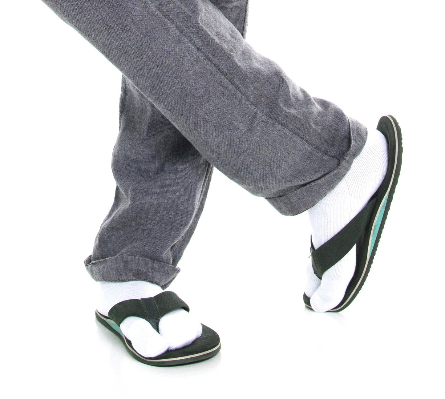 Close-up of white V-Toe athletic split-toe tabi mini-crew socks worn on the feet