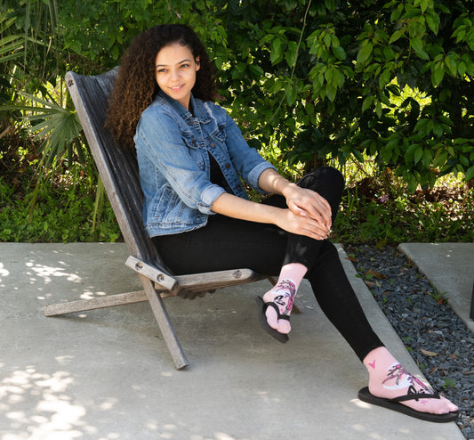 Woman wearing pink ninja pattern V-Toe split-toe tabi crew socks