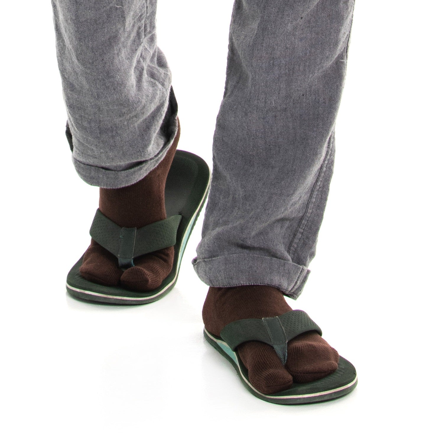 Close-up of brown V-Toe athletic split-toe tabi crew socks worn on the feet
