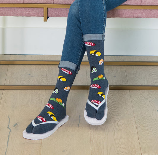 Sushi pattern V-Toe split-toe tabi socks worn with flip-flops
